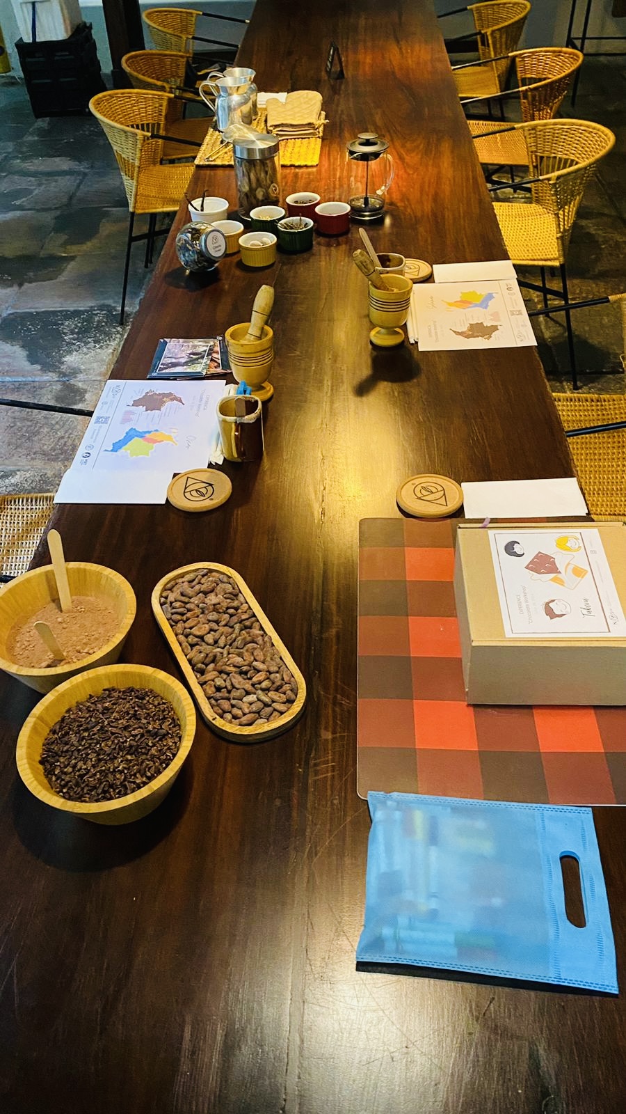Guests selecting spices and ingredients for a personalized cup of hot chocolate